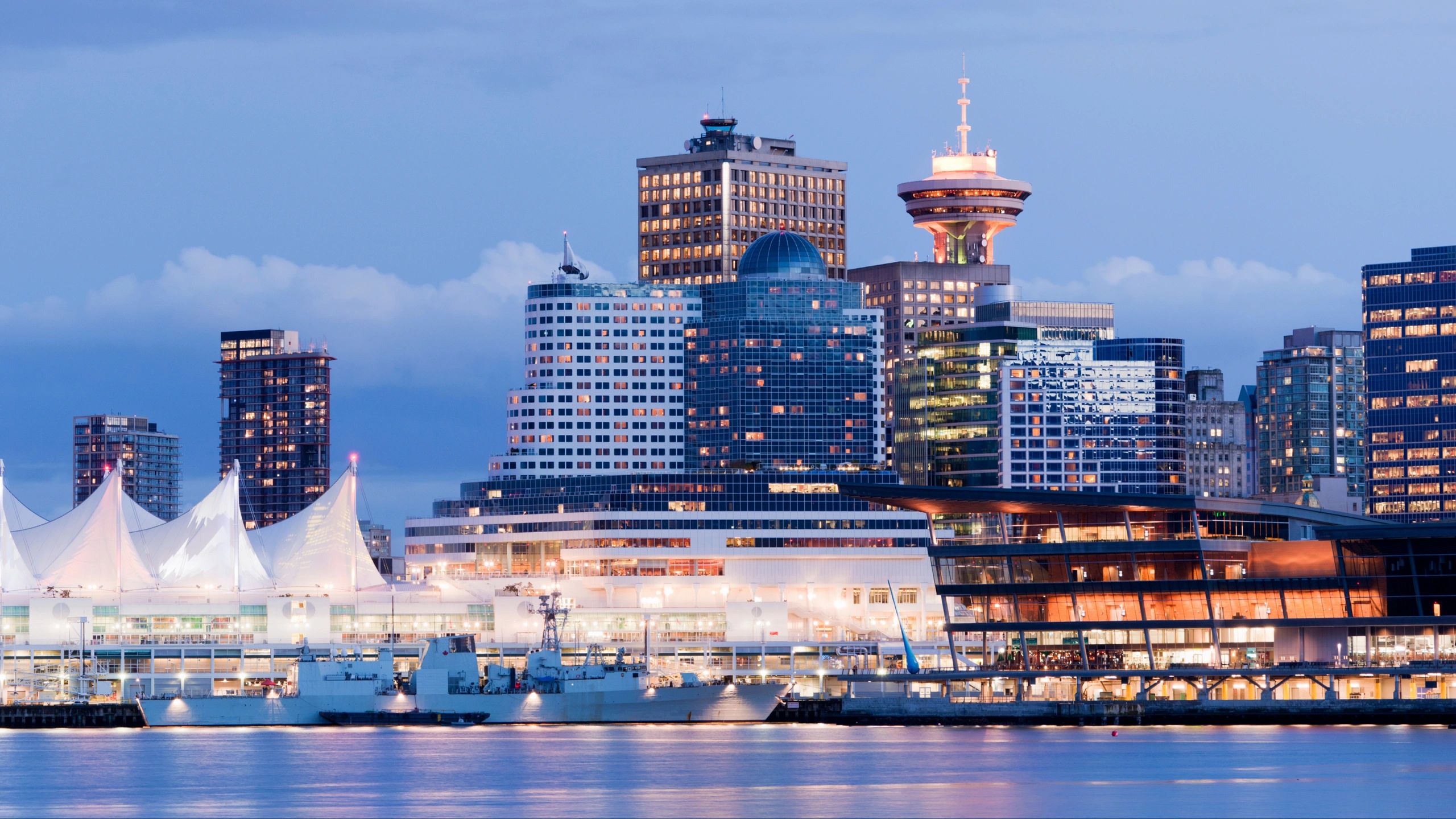 Vancouver Waterfront Skyline during the night next to Canada Place.