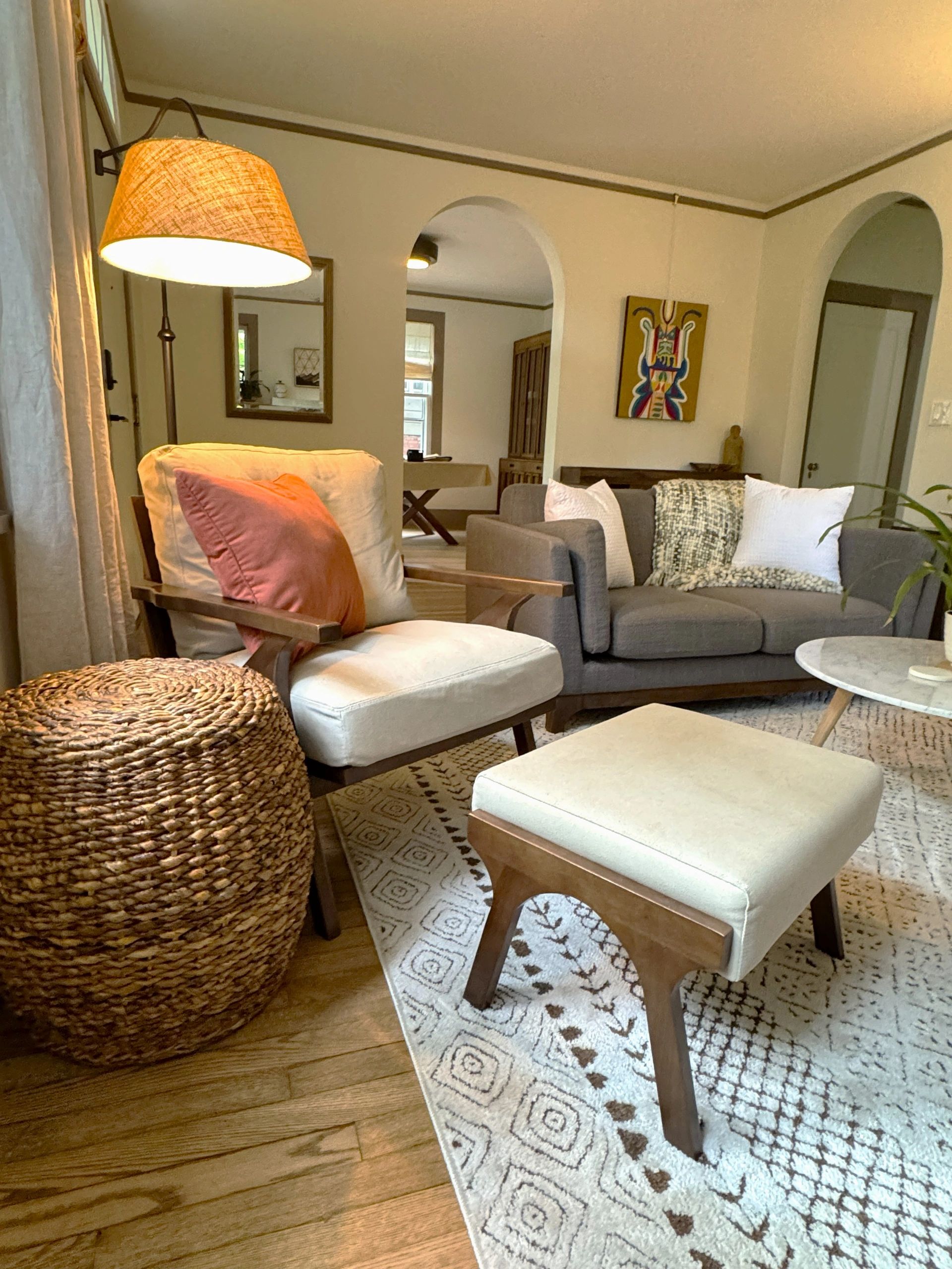 Cozy living room with warm lighting and comfortable seating.