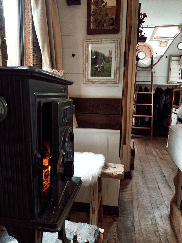 a photo of a mobile home with the log burner on south devon hedgelaying 