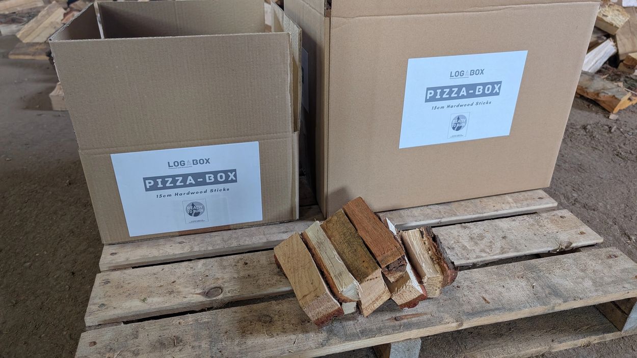 Our Pizza-Box with 15cm hardwood sticks. Box weighs approx 20kg and can supply for many burns.