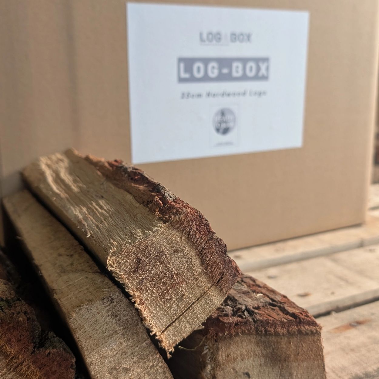 Our Log-Box with 25cm hardwood logs. Box weighs approx 20kg and can supply for many burns.