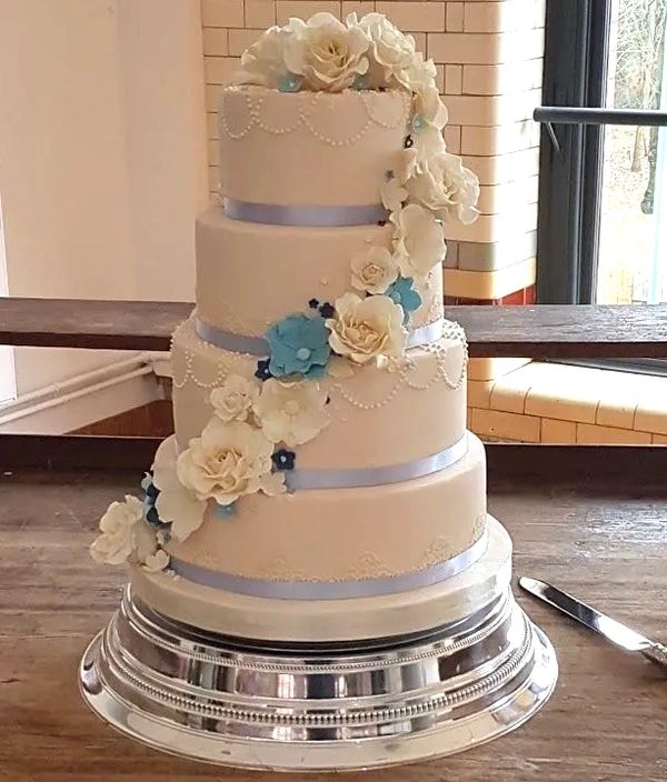 Elegant 4 tier Wedding cake baby blue , cornflower  blue flowers