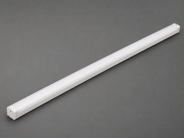 A white LED tube light on a gray background.