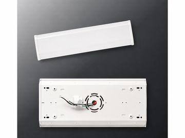 White rectangular device with wires and cover.