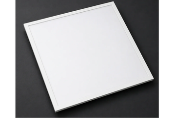White square LED panel light on black surface.