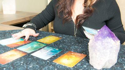 Me reading tarot and oracle cards based on my code of ethics.