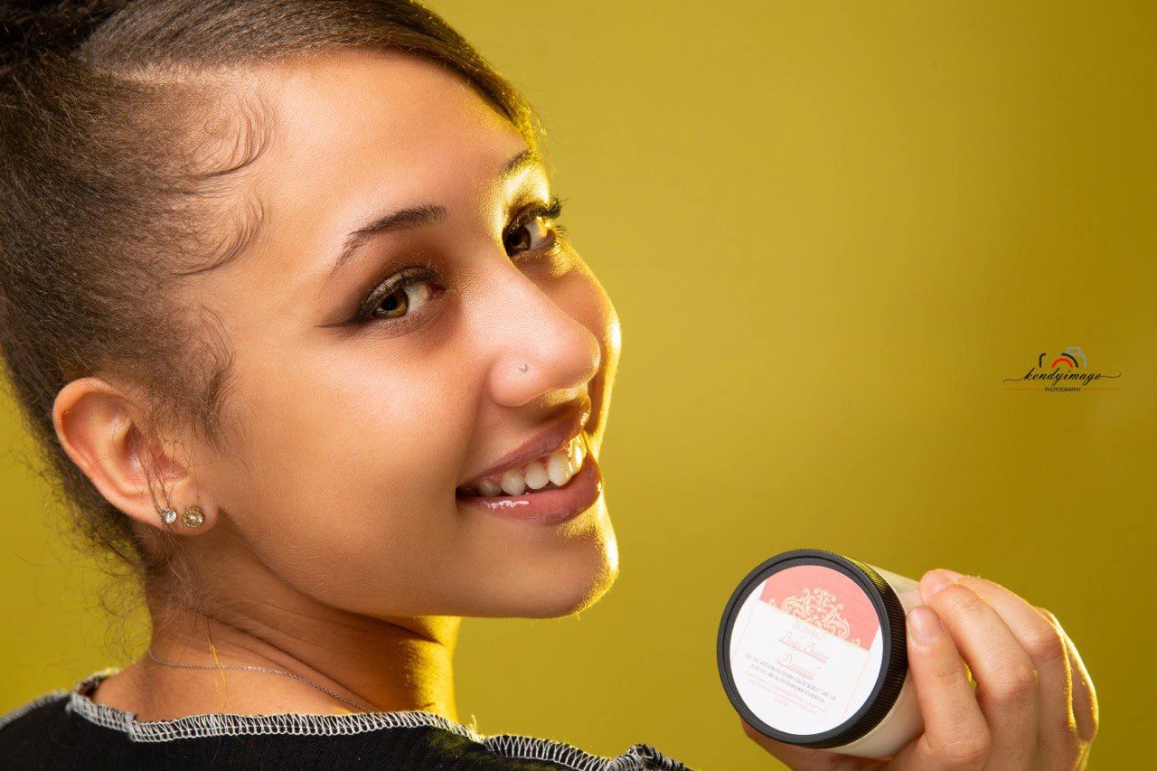 Smiling woman, even skin tone