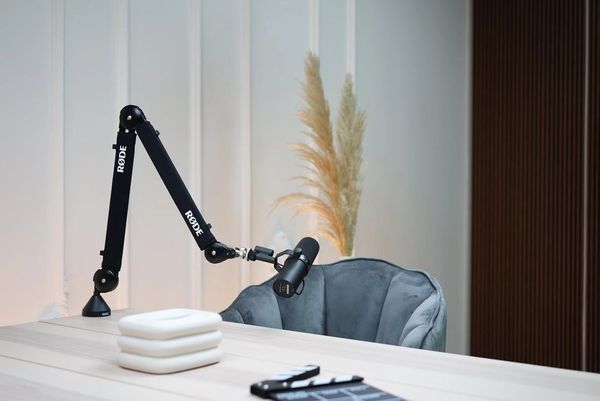 Modern podcast studio design in Dubai with ergonomic furniture and lighting.