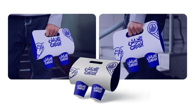 Blue and white branded packaging boxes with Arabic text and the word 'CRUSH'.