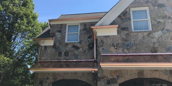 Beautiful copper gutters done in K style...