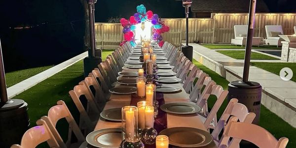 Outdoor event setup with white garden chair rentals and patio heater rentals in  Frisco, Tx.