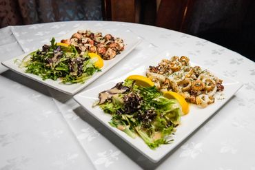 Delicious meat meal served with fresh herbs on a table

