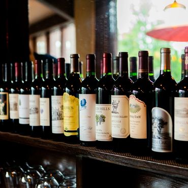 Well-stocked liquor shelves showcasing premium bourbon and rye whiskey