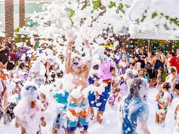 Kids at a foam party
