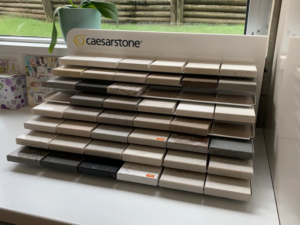 Caesarstone nuvo calacutta concrete intense white grey stone sample kitchen attica shimmer