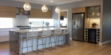 A sleek modern Australian kitchen designed by Osborne’s Kitchens, featuring Caesarstone countertops 