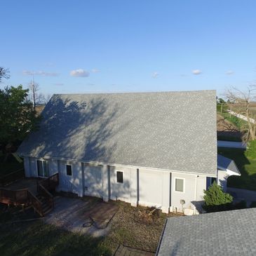 Asphalt shingle roof replacement in Des Moines with synthetic underlayment installed
