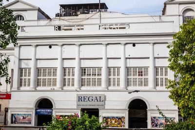 Regal Theatre building with white facade.