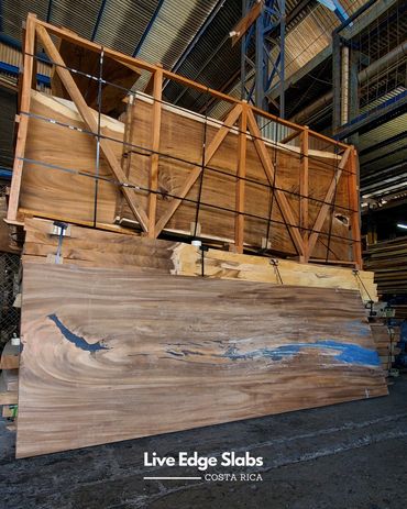 Solid wood slabs with rich grain patterns. Live edge lumber from Costa Rica, ideal for high-end cust