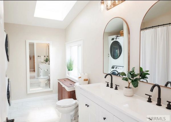 Master Bathroom with washer and dryer