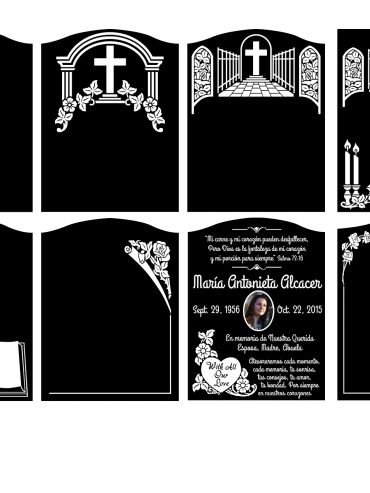 Black and white memorial plaques with crosses and floral designs.