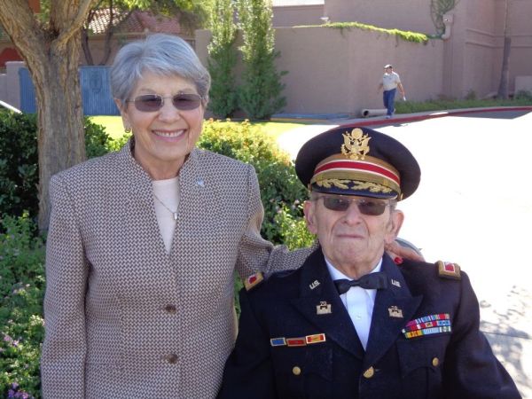 Retired military couple at The Fountains retirement home in Tucson with At Home Seniors caregiver su