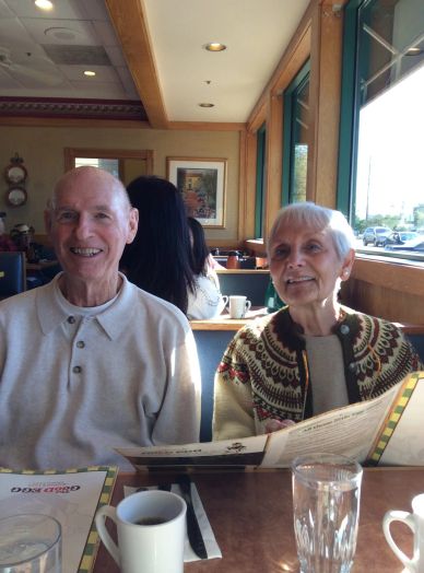 Elderly couple enjoying lunch in tucson az with the help of our At Home Seniors caregivers.