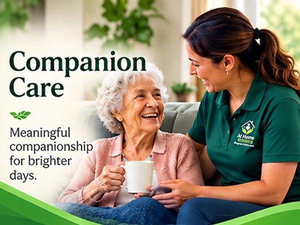 Caregiver sharing a joyful moment with an elderly woman.
