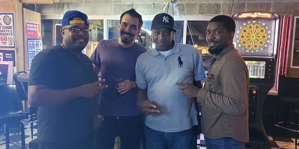 Close friends standing side by side looking ahead