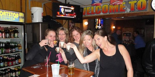 Five young friends enjoying time together, looking forward