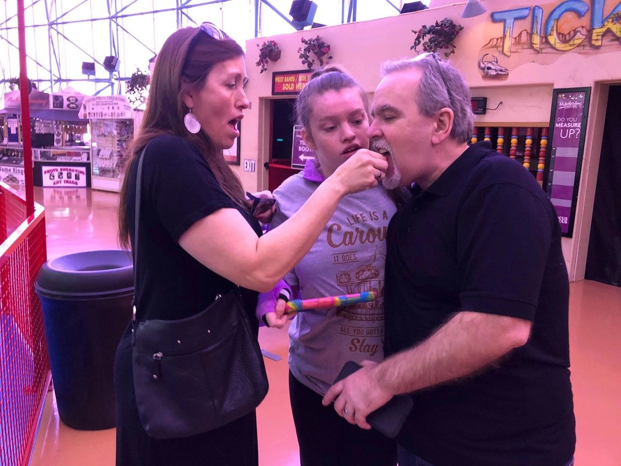 Mom Anne Mari gives Mike Cannabis Candy at the Carousel