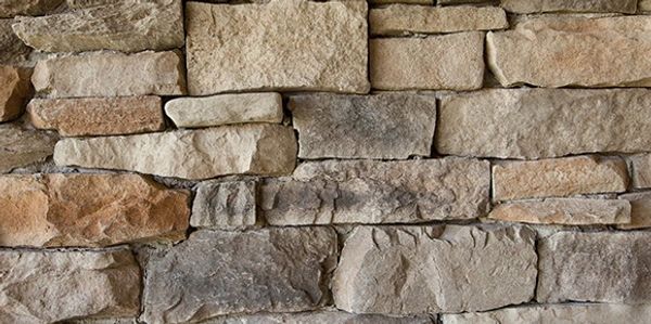 Dry stack stone veneer siding by ES Home Improvement contractor of Denver, Colorado.