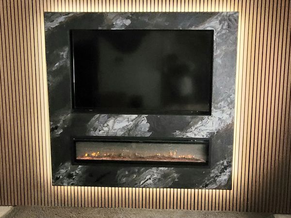 One of a kind custom 65"TV Square Metalic Epoxy floating wall & 60" fireplace and LED rear lighting