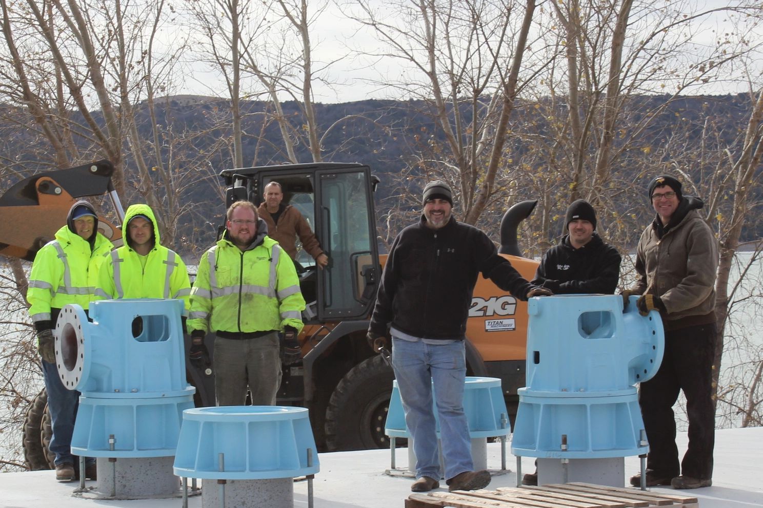 Water management system technicians from Impel on a service call