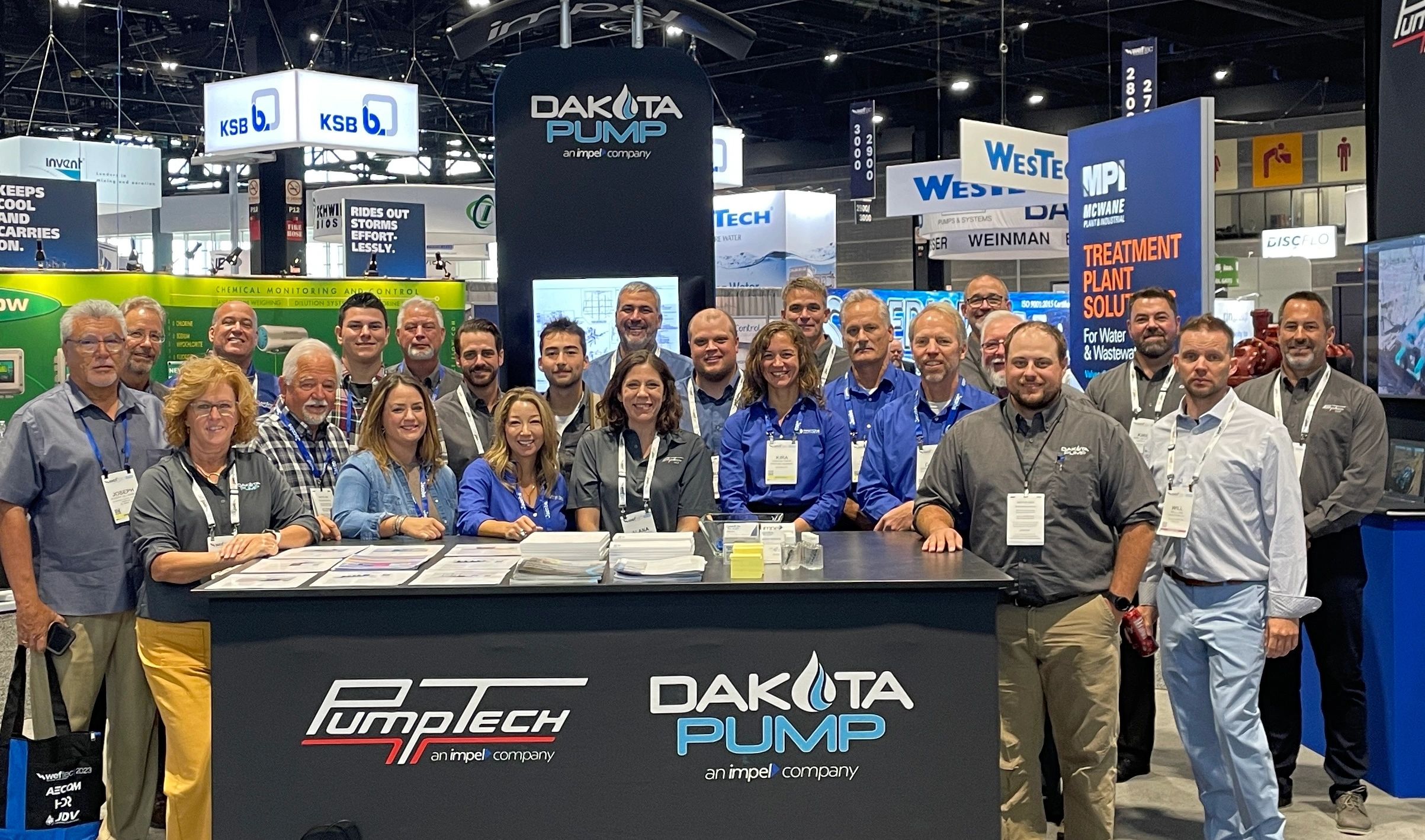 Impel, Dakota Pump, Pumptech employees at WEFTEC 2023 in Chicago