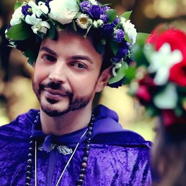 Alex Reyes-Ortiz celebrating a handfasting ceremony as a Priestess of Avalon