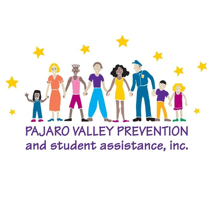 Diverse group holding hands under stars with Pajaro Valley Prevention logo.
