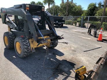 Construction Skid steer welding repair at the airport. 