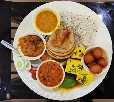 Varieties of dishes in Thali.