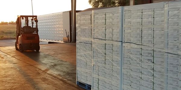 Pallets sitting on the dock waiting to be loaded