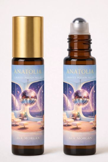 Two bottles of Anatolia Gravity Potion No. 01 by Ava Morgan with cosmic-themed labels.