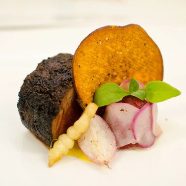 Cocoa and Coffee Crusted and Raw Bison Tartare with Crispy Yam, Poached Radish, and Ice Plant