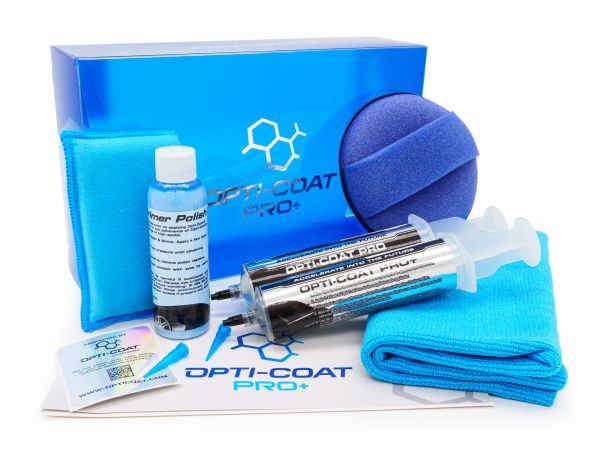 Opti-Coat Pro+ detailing kit with polish, applicators, and cloths.
