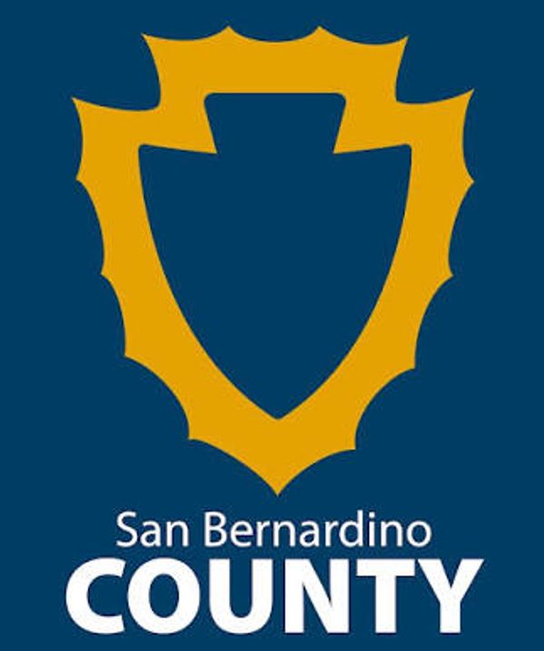 San Bernardino County logo in blue and gold.