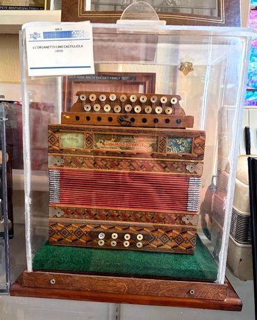 L'Organetto donated by Lino Castigliola (2019). Notice the beautiful and intricate decorative inlay.