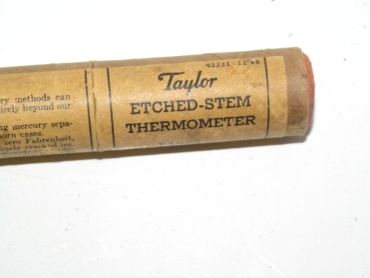 Close-up of a vintage Taylor etched-stem thermometer tube.