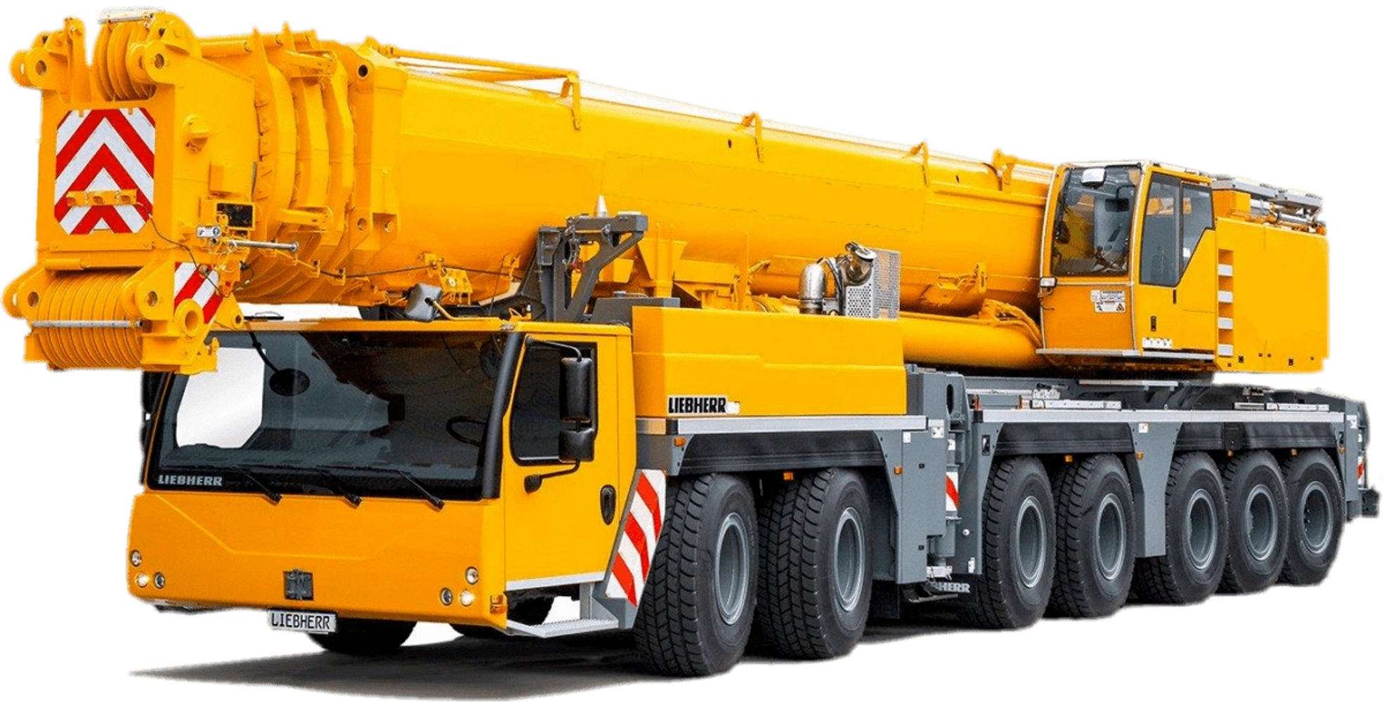 A large yellow Liebherr mobile crane with eight wheels and an extended boom.