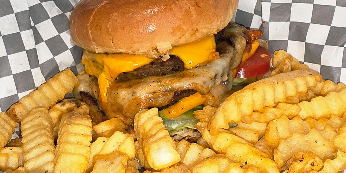 Cheeseburger Double meat 80% lean with triple cheese colby jack and mozarella plus crinkle fries