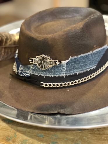 Brown hat with Harley-Davidson emblem and denim band.
