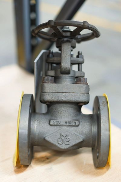 Industrial metal valve with a handwheel for flow control.